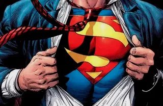 Çizgi roman karesi: Superman gömleğini açarak göğsündeki S amblemini ortaya çıkarıyor